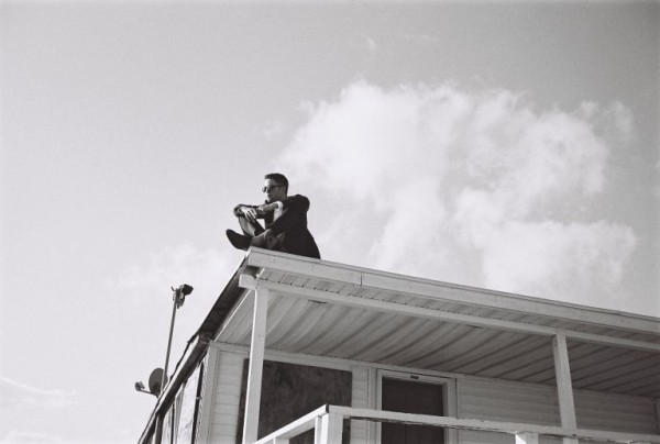 Robert Pattison Dior rooftop