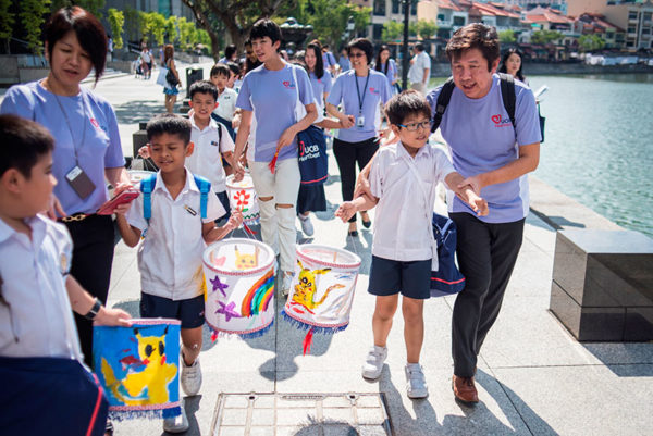 photo-2_apsn-students-walk-along-the-singapore-river-to-commemorate-the