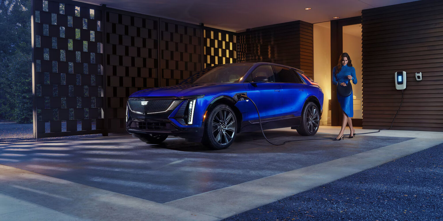 Luxury electric vehicle charging at home in a refined lifestyle setting